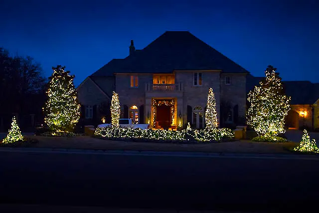Front yard all white Christmas lighting