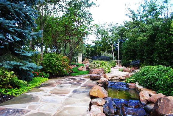 Stream, flagstone path landscaping